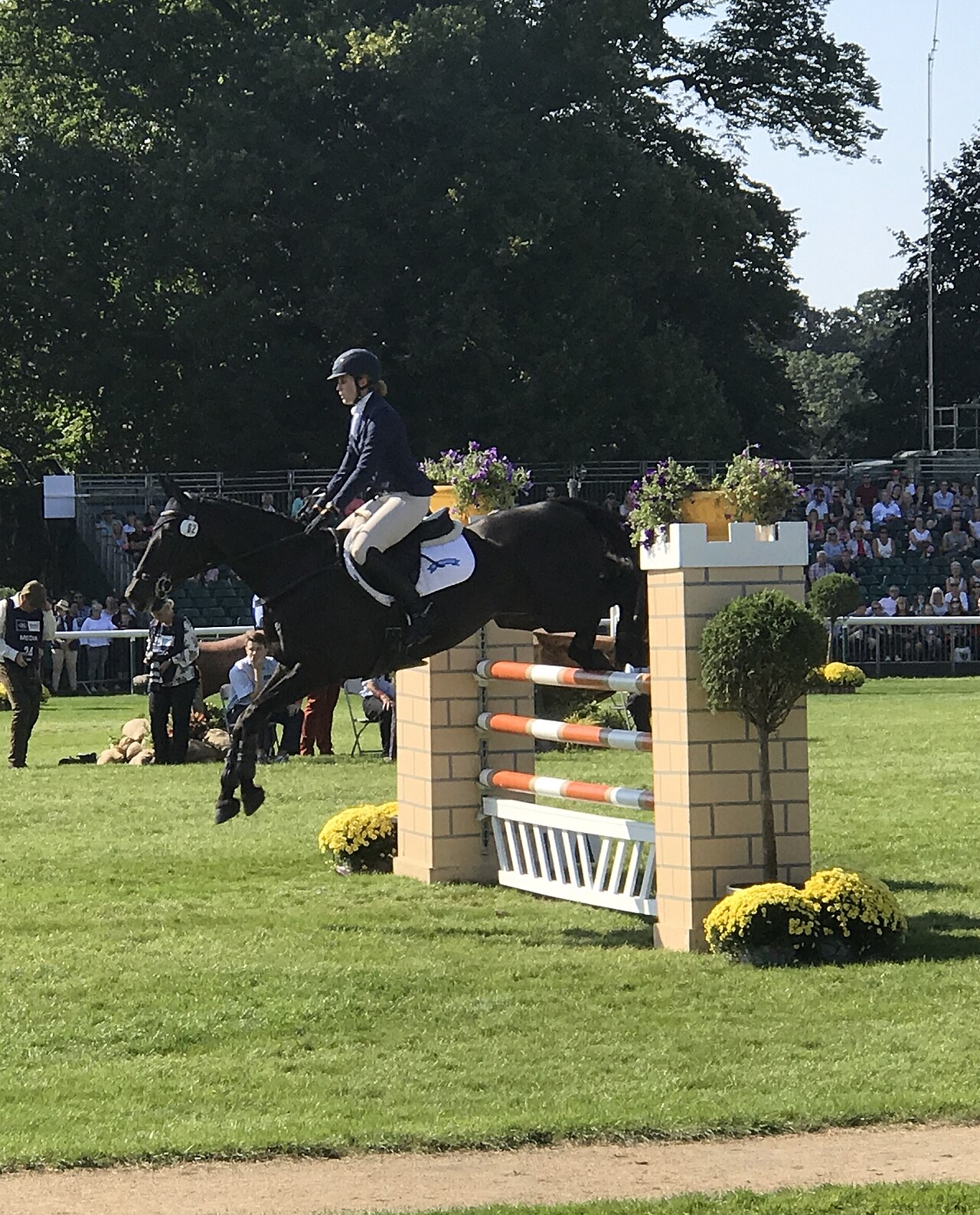 Showjumping in the main arena on the final day of the Burghley Horse Trials